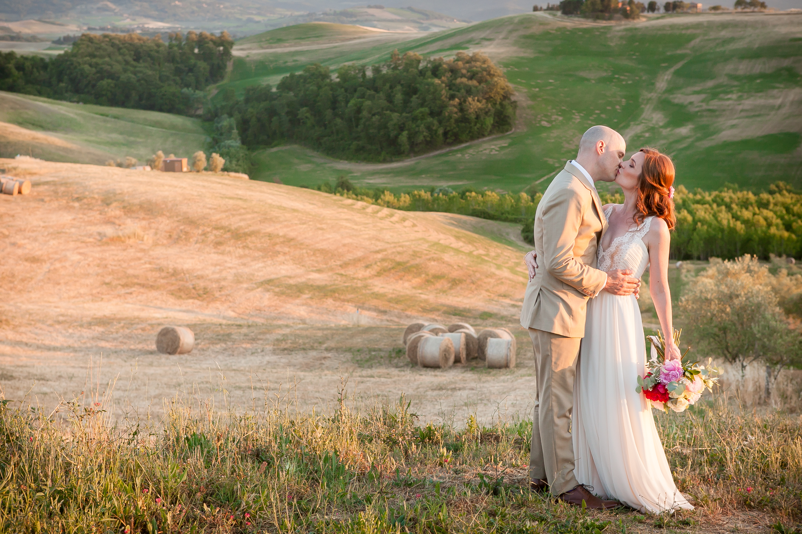 Bride & Groom kiss - Countryside Wedding in Tuscany 