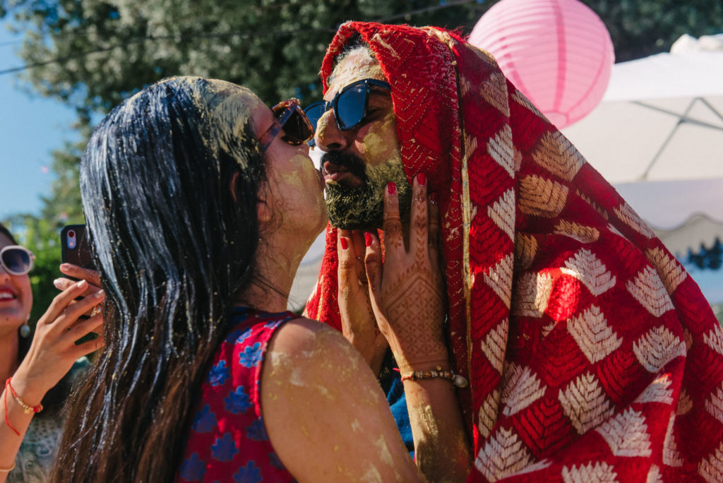 Sweet Kiss during Haldi Ceremony - Indian Wedding in Tuscany - Italian Wedding Designer