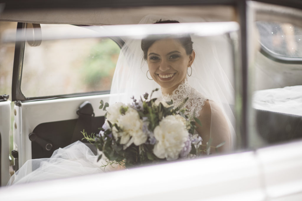 Bride in the car - Wedding at Castello di Meleto - Italian Wedding Designer